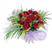 One Dozen Red Roses Wrapped in Paper